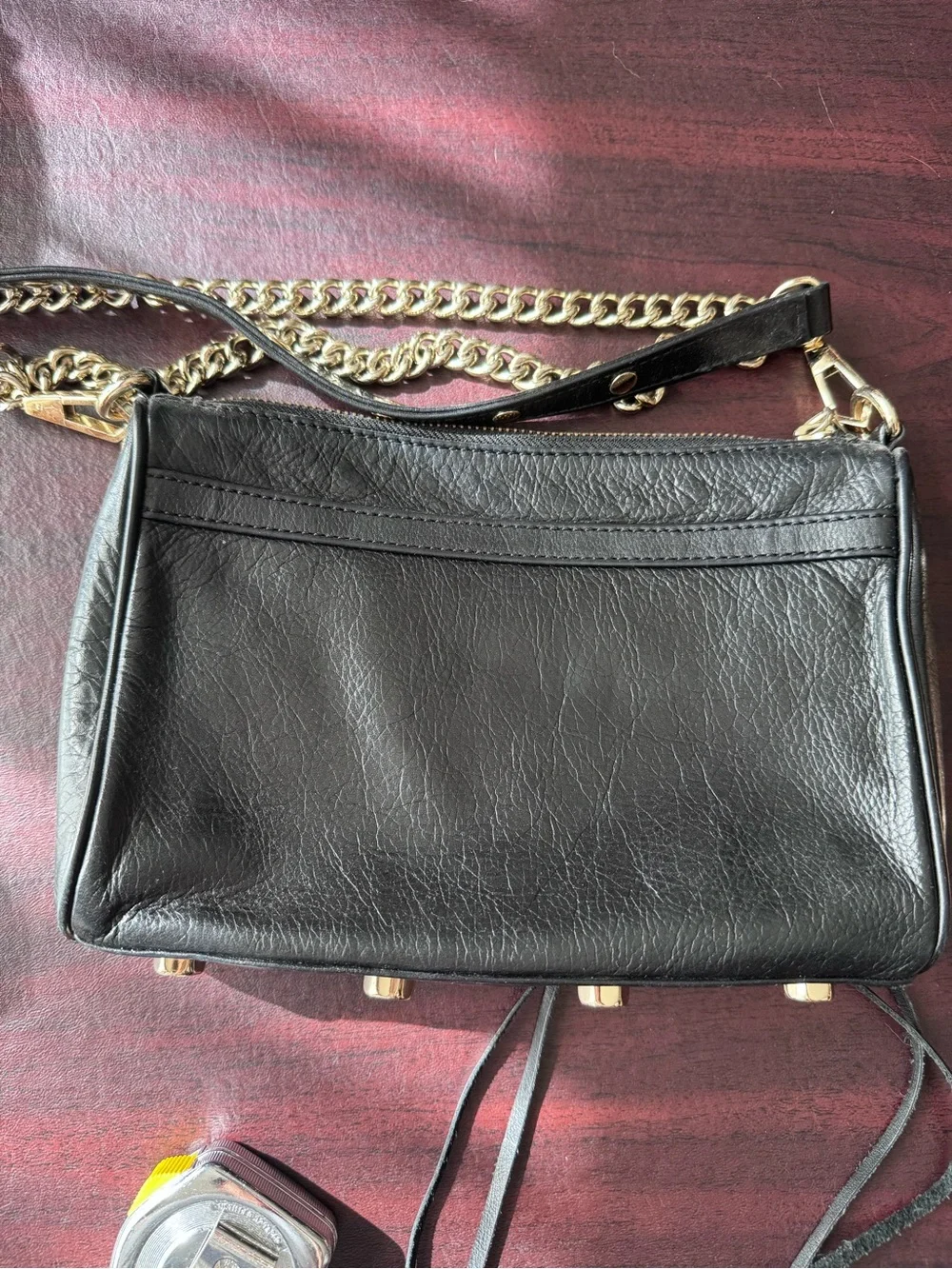 Rebecca Minkoff Mini M.A.C. crossbody bag featuring black Gold tone hardware